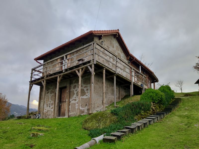 Granite farmhouse with wooden terrace